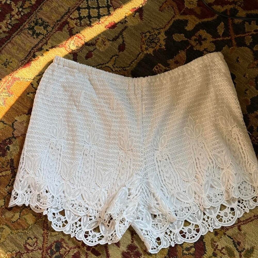 White shorts with eyelet detail